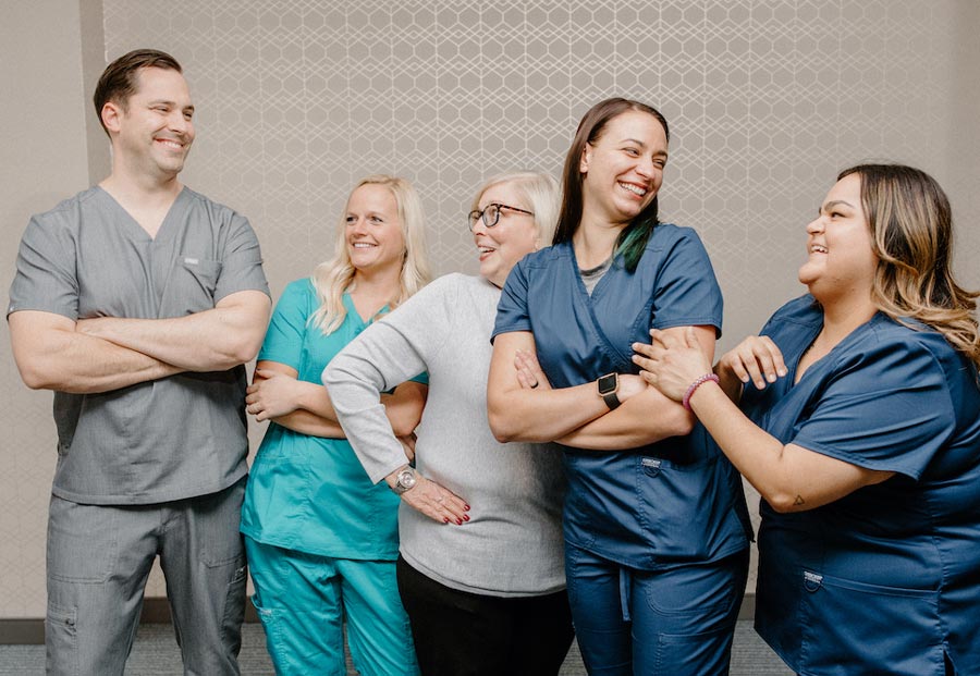 group of laughing dental professionals