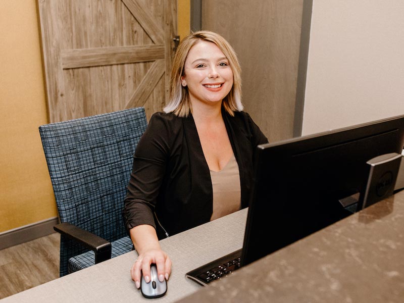 receptionist at desk